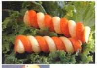 عکس هویج آرایی به شکل ماکارونی پیچ و گل برای روی سالاد